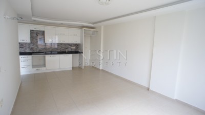 Недорогая квартира 1+1 в новом доме с бассейном в центре Махмутлара фото 16