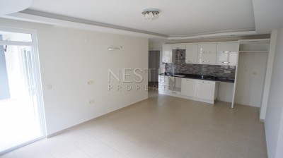 Недорогая квартира 1+1 в новом доме с бассейном в центре Махмутлара фото 18