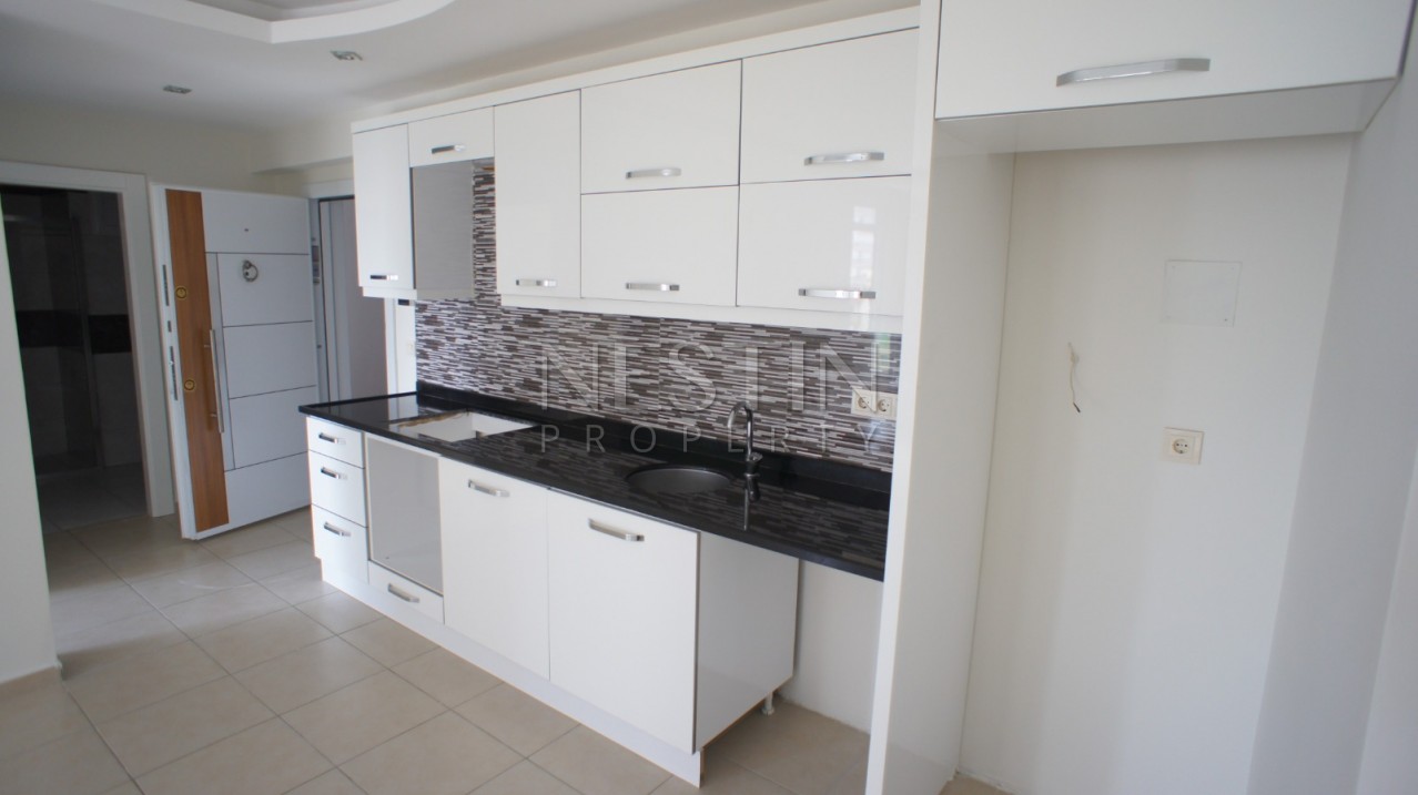 Недорогая квартира 1+1 в новом доме с бассейном в центре Махмутлара фото 14