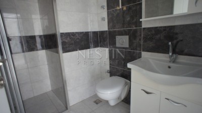 Недорогая квартира 1+1 в новом доме с бассейном в центре Махмутлара фото 20