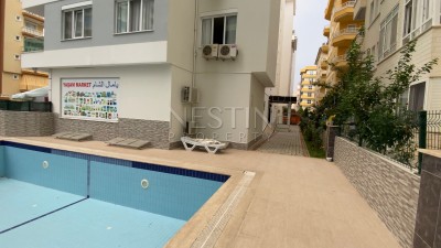 Недорогая квартира 1+1 в новом доме с бассейном в центре Махмутлара фото 2