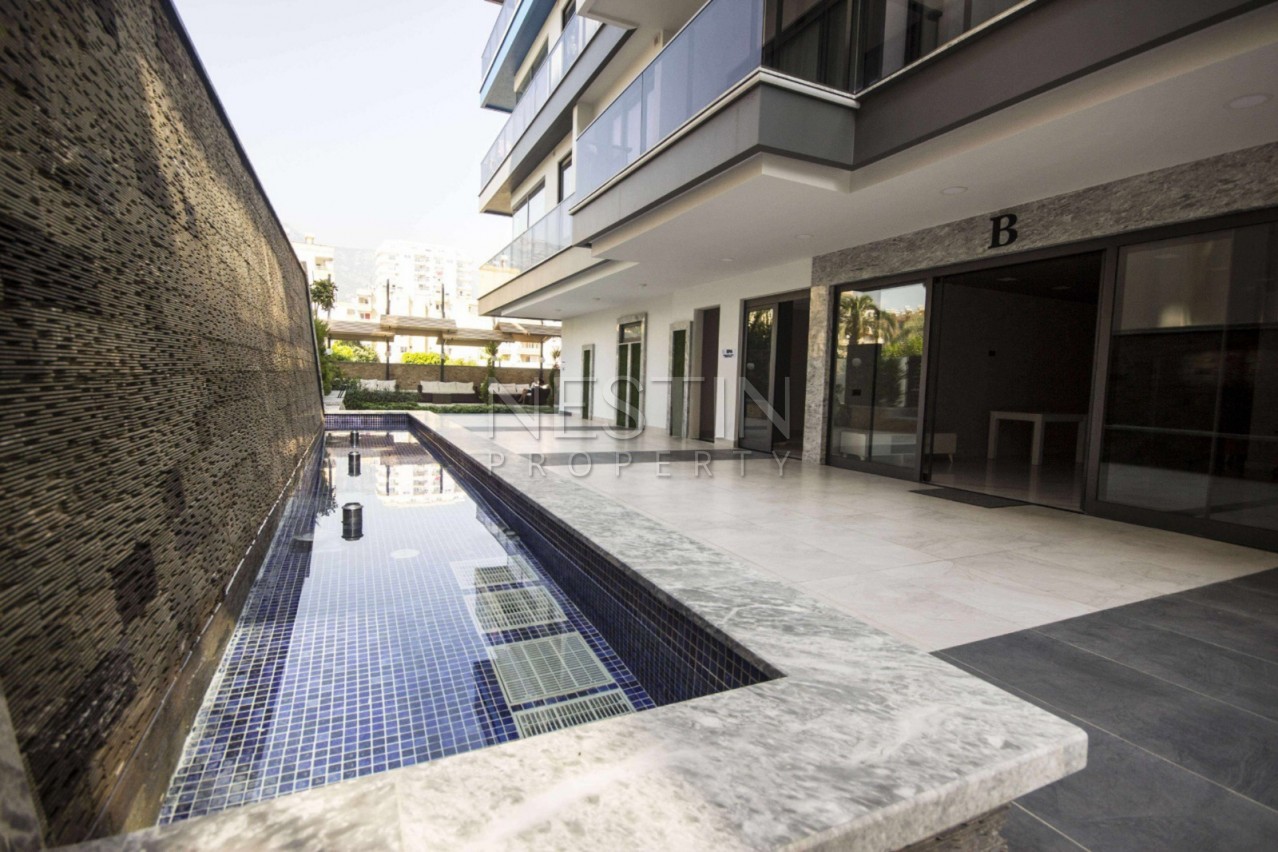 Квартира 1+1 с мебелью в резиденции класса Люкс на первой линии от моря фото 28