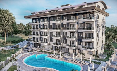 Квартиры 1+1 и дуплексы 2+1 в новом жилом комплексе в районе Оба на этапе строительства фото 1