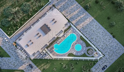 Квартиры 1+1 и дуплексы 2+1 в новом жилом комплексе в районе Оба на этапе строительства фото 5