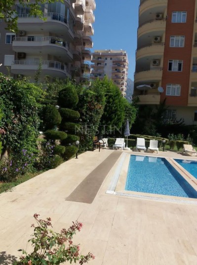 Квартира 2+1 с люксовой мебелью в жилом комплексе с бассейном в Махмутларе фото 3