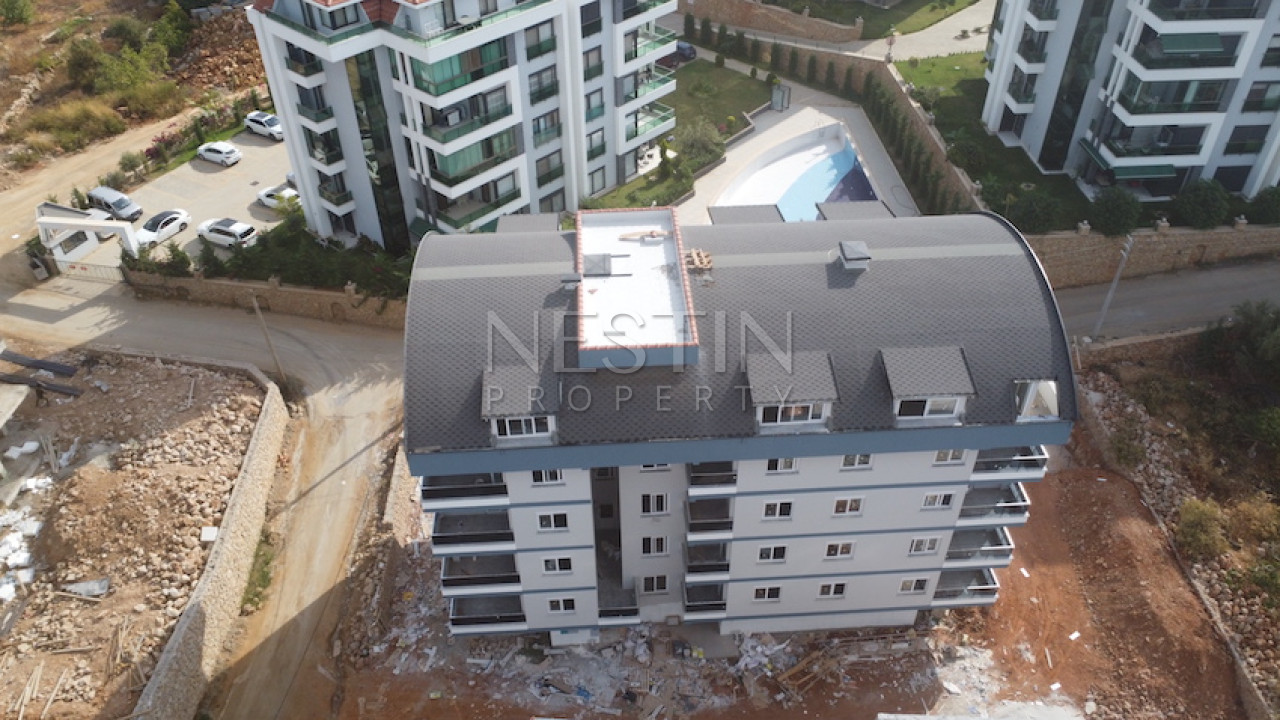 Квартира 1+1 в новом доме в районе Оба в 1500 м от Средиземного моря фото 1