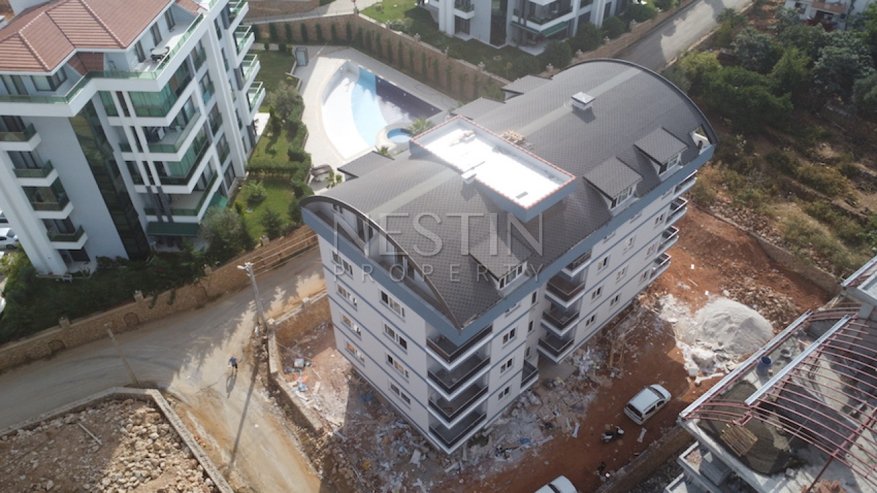 Квартира 1+1 в новом доме в районе Оба в 1500 м от Средиземного моря фото 2