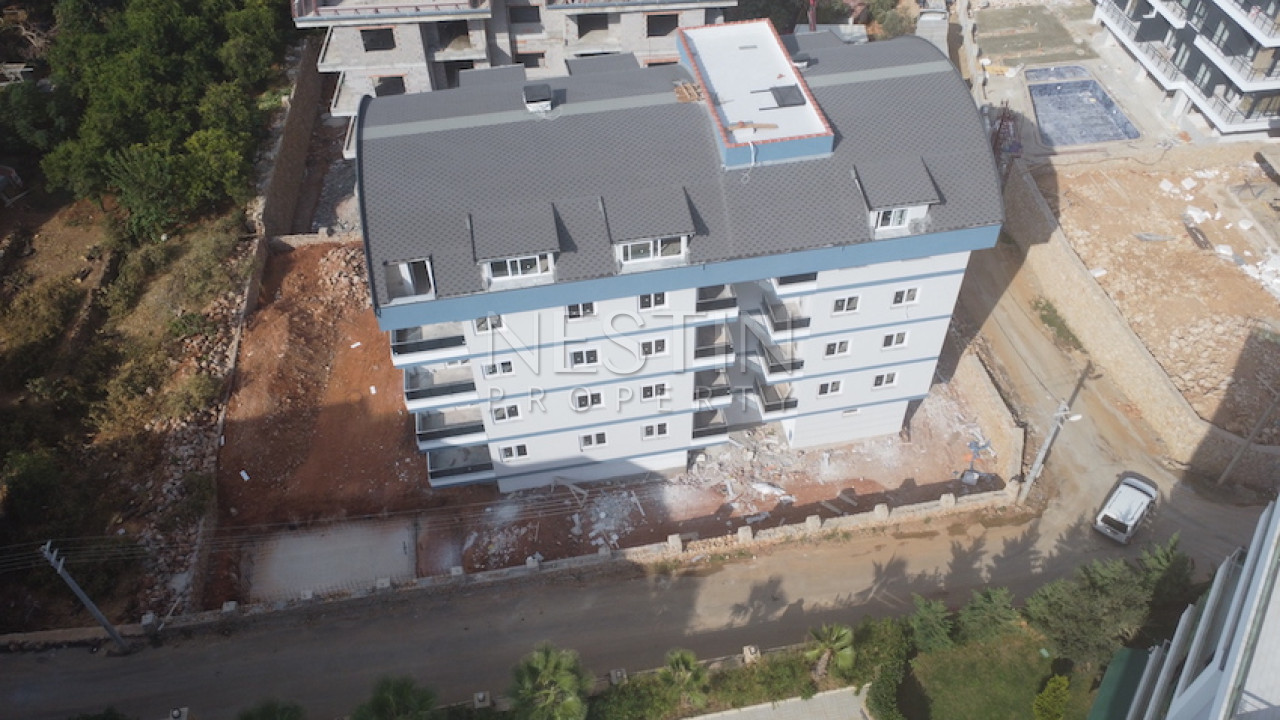 Квартира 1+1 в новом доме в районе Оба в 1500 м от Средиземного моря фото 3