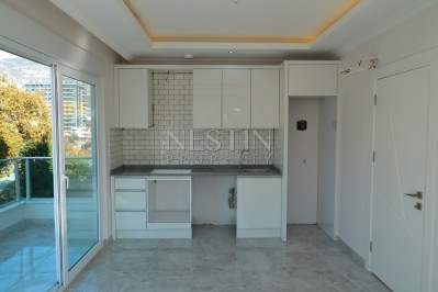 Квартира 1+1 в комплексе с зимним бассейном в Махмутларе фото 12