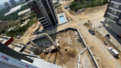 Просторные апартаменты 3+1 с отдельной кухней в новом жилом комплексе в Махмутларе фото 33