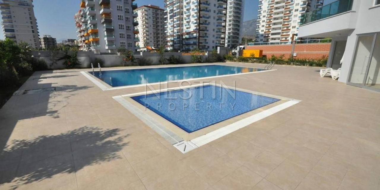 Меблированная квартира 1+1 в 5 минутах ходьбы от моря в Махмутларе фото 24