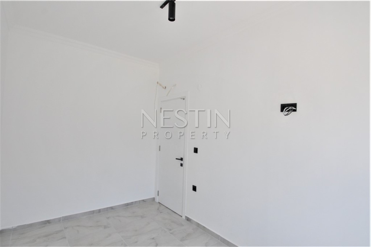 Квартира 1+1 в районе Авсаллар в новом доме, в 1400 м от Средиземного моря фото 7