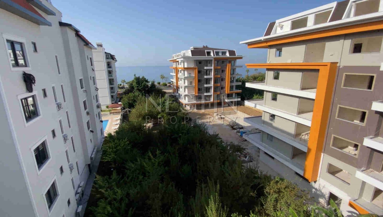 Двухуровневые апартаменты 4+1 с видом на море в уютном жилом комплексе в районе Кестель фото 10