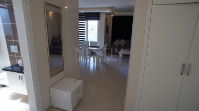 Меблированные апартаменты 1+1 в районе Кестель в 150 метрах от моря фото 13