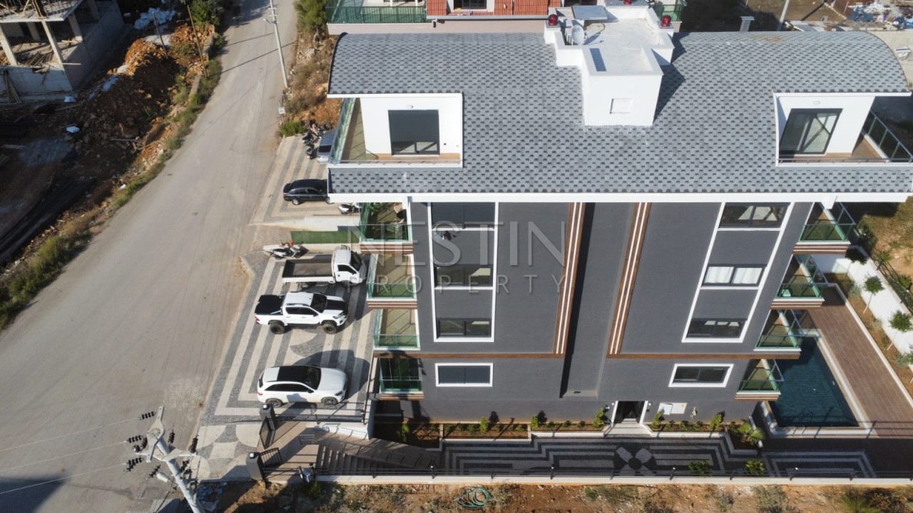 Квартира 2+1 в новом ЖК в районе Оба в 2000 метрах от Средиземного моря. фото 2