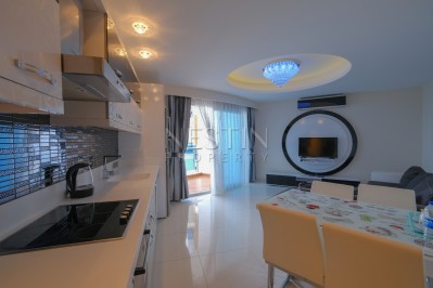 Квартира 1+1 с видом на море в роскошном комплексе в Махмутларе фото 30