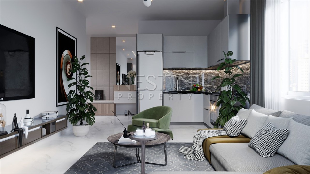 Квартира 1+1 в новом строящимся комплексе в районе Конаклы 850 метрах от моря фото 7