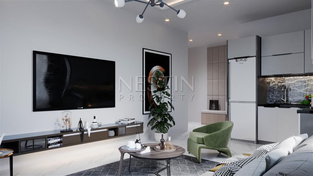 Квартира 1+1 в новом строящимся комплексе в районе Конаклы 850 метрах от моря фото 9