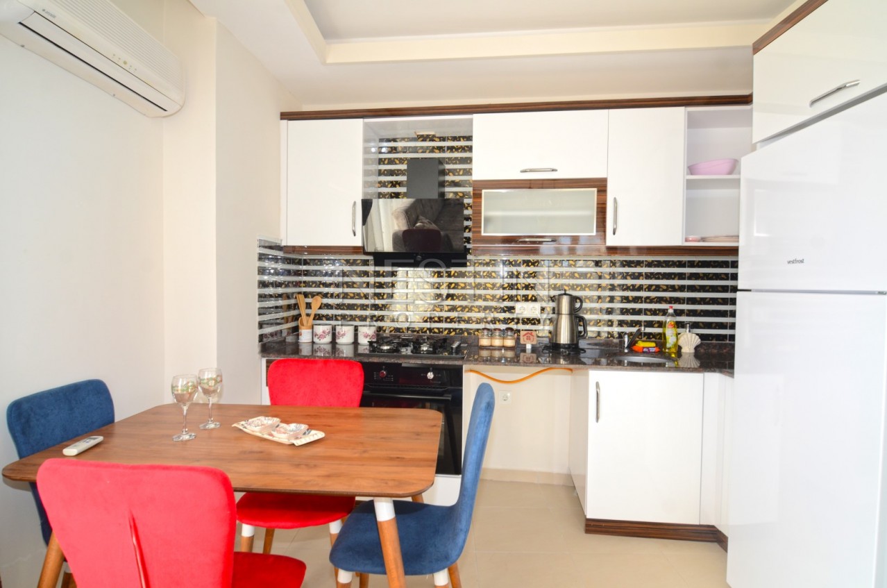 Уютная меблированная квартира 1+1 в Махмутларе в комплексе фото 13