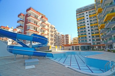 Квартира 2+1 в новом комплексе возле моря в Махмутларе фото 2