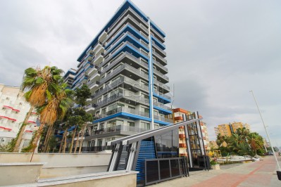 Квартира 1+1 в роскошном комплексе на первой линии в Махмутларе фото 3