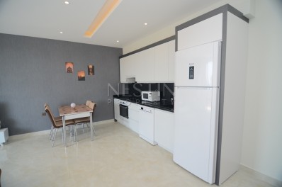 Квартира 1+1 в роскошном комплексе на первой линии в Махмутларе фото 25