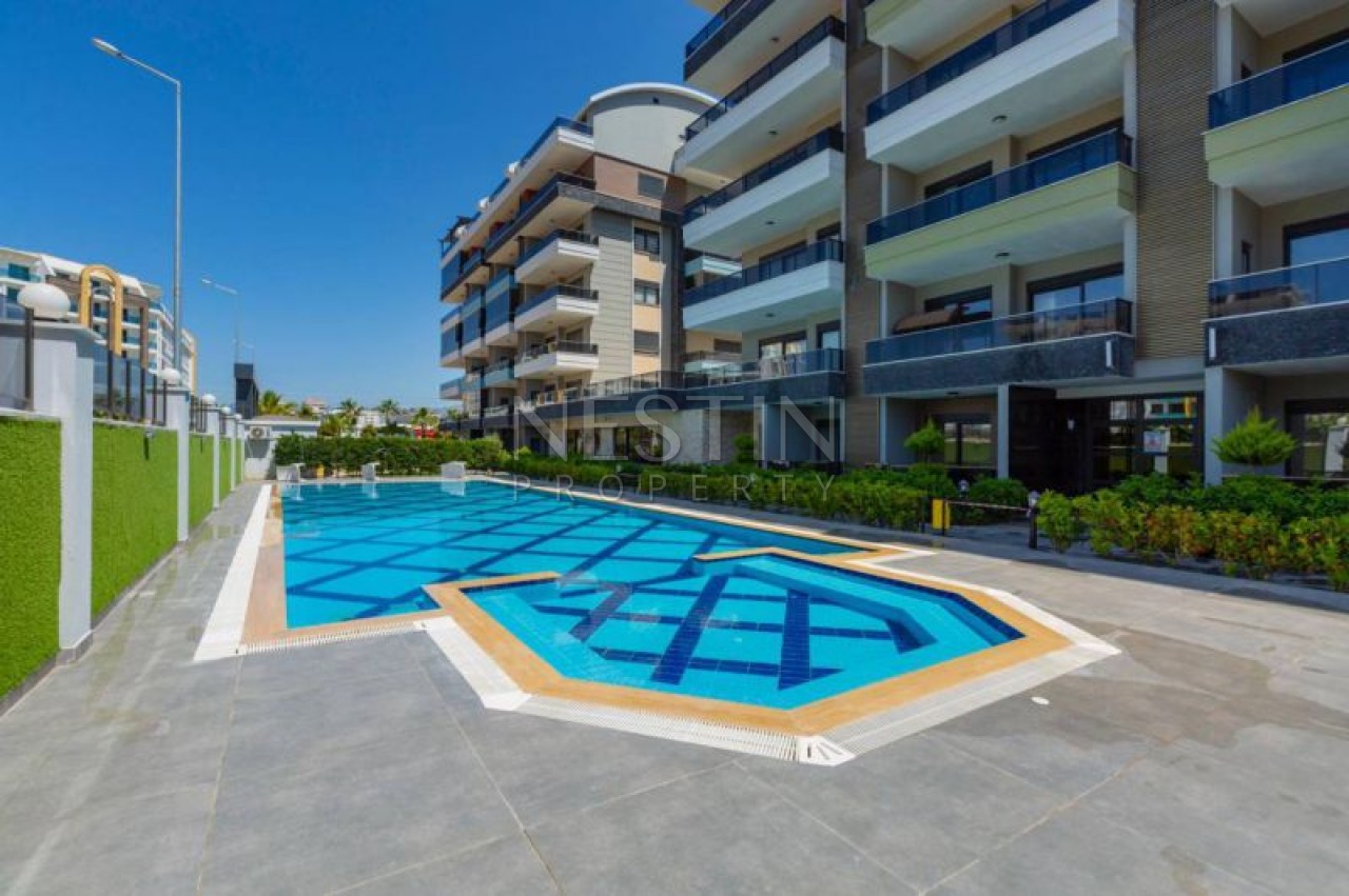 Квартира 1+1 в районе Каргыджак в 100 метрах от Средиземного моря. фото 2