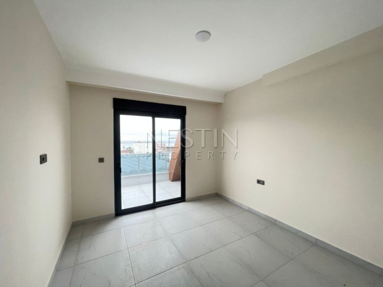 Двухуровневая квартира 4+1 в районе Каргыджак в 1000 метрах от Средиземного моря. фото 12