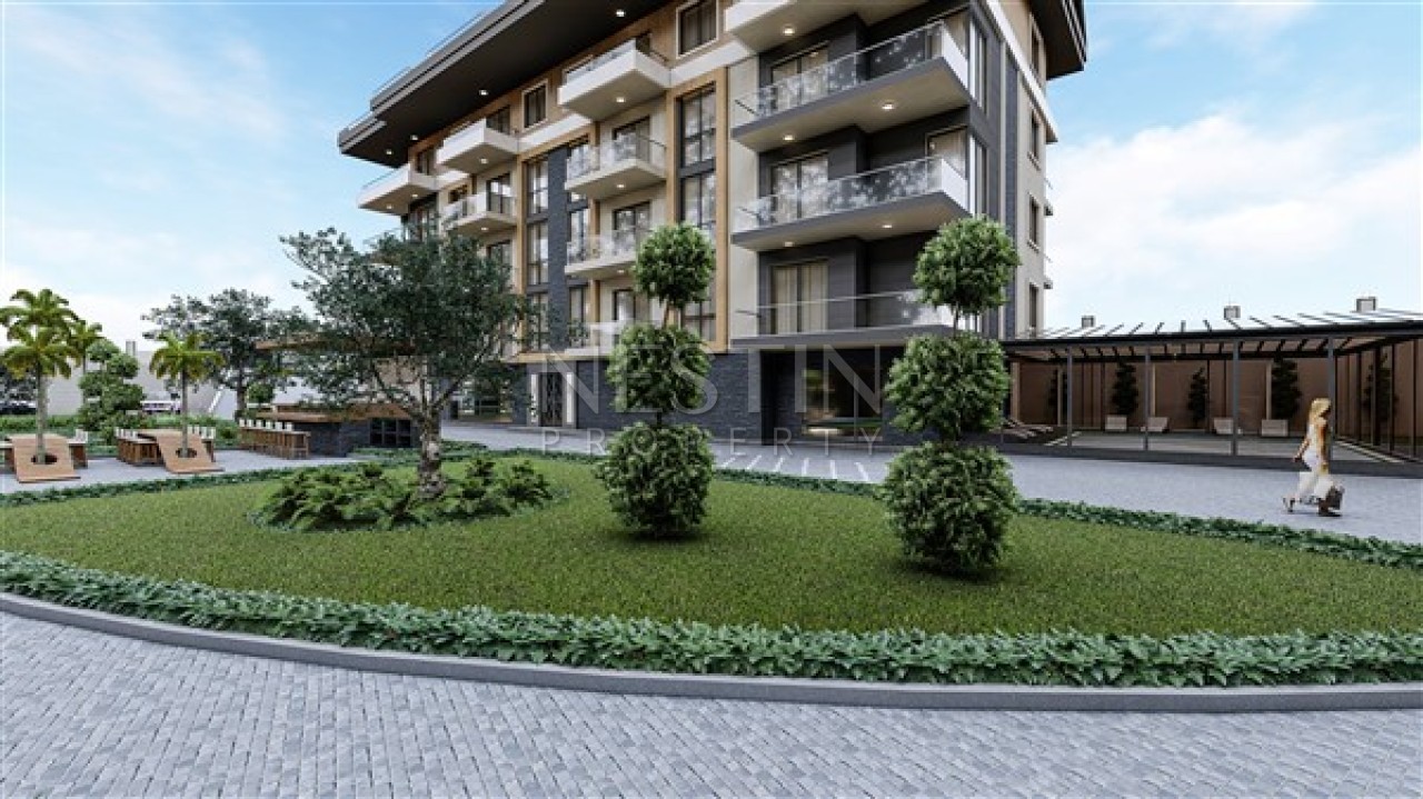 Квартира 1+1 в новом ЖК в стадии строительства в районе Оба в 1500 метрах от моря. фото 5