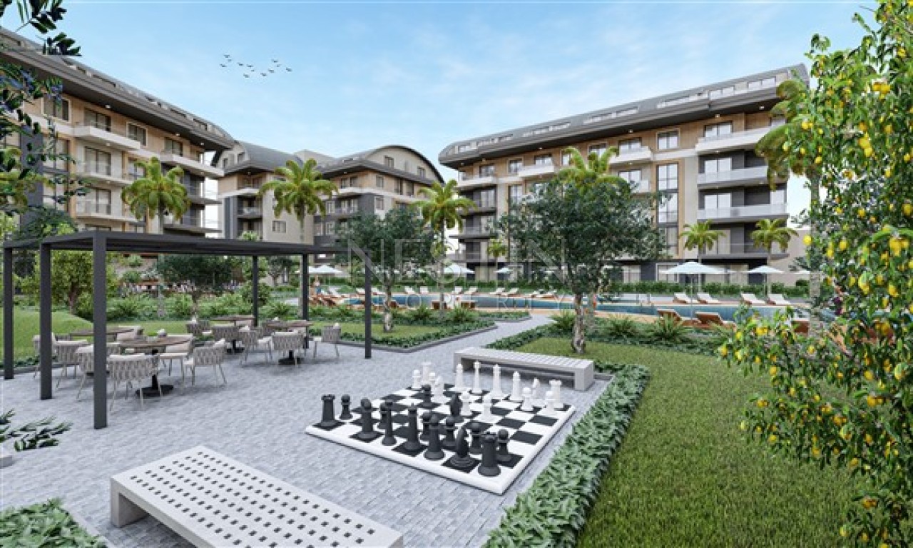 Квартира 1+1 в новом ЖК в стадии строительства в районе Оба в 1500 метрах от моря. фото 9