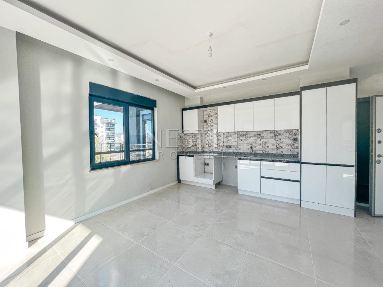 Квартира 1+1 в районе Авсаллар в новом жилом доме фото 9