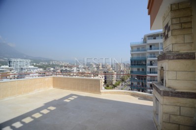 Панорамный пентхаус 4+1 с видом на море в Махмутларе фото 15