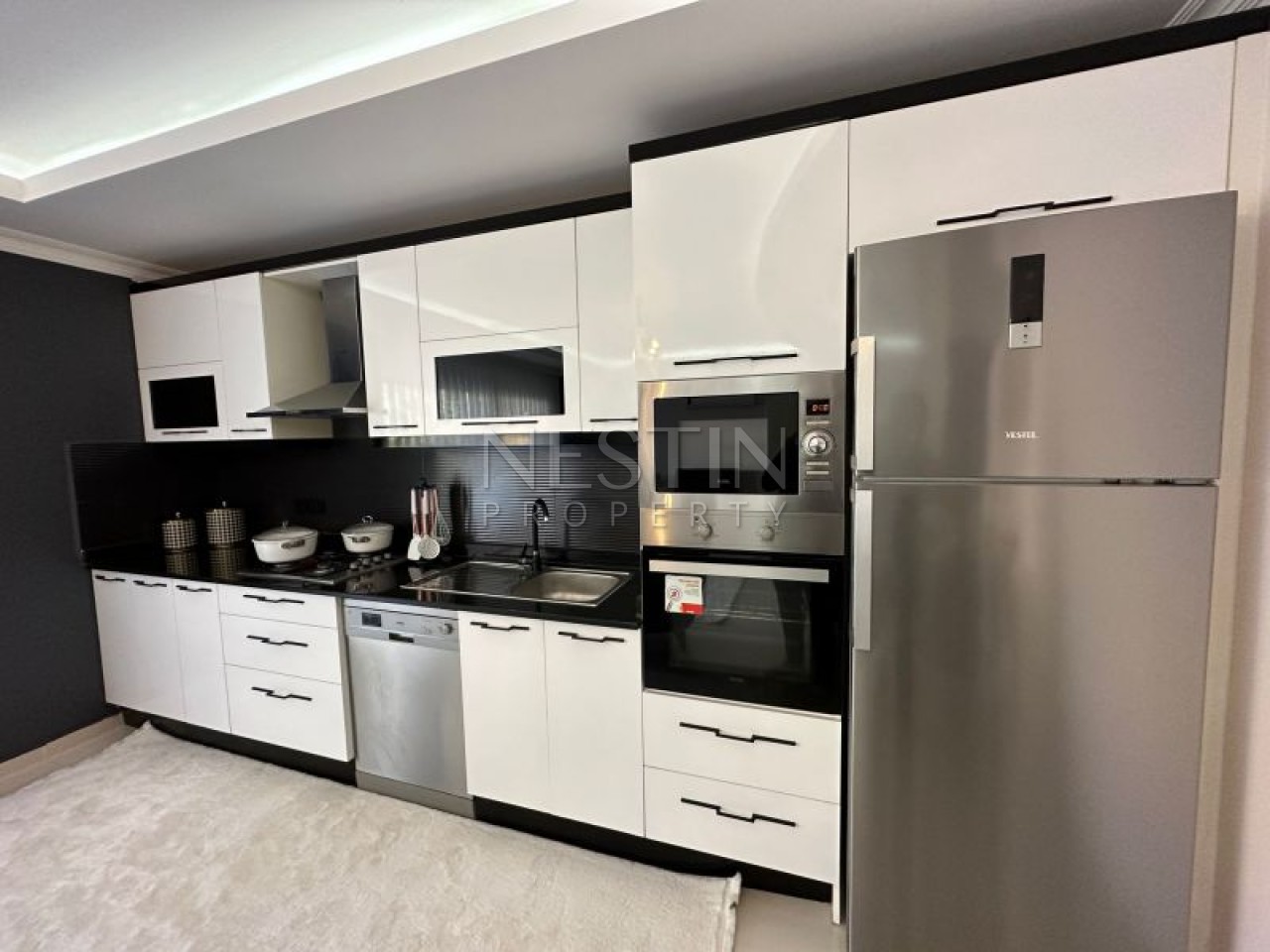 Квартира 2+1 в районе Тосмур в 400 метрах от Средиземного моря фото 2