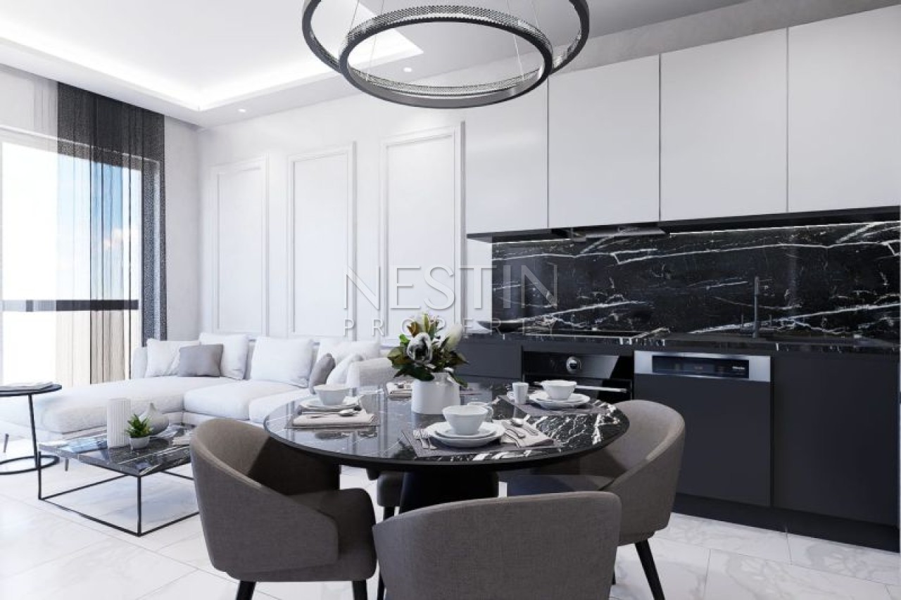 Квартиры в новом ЖК на стадии строительства в районе Демирташ в 2500 метрах от моря фото 16