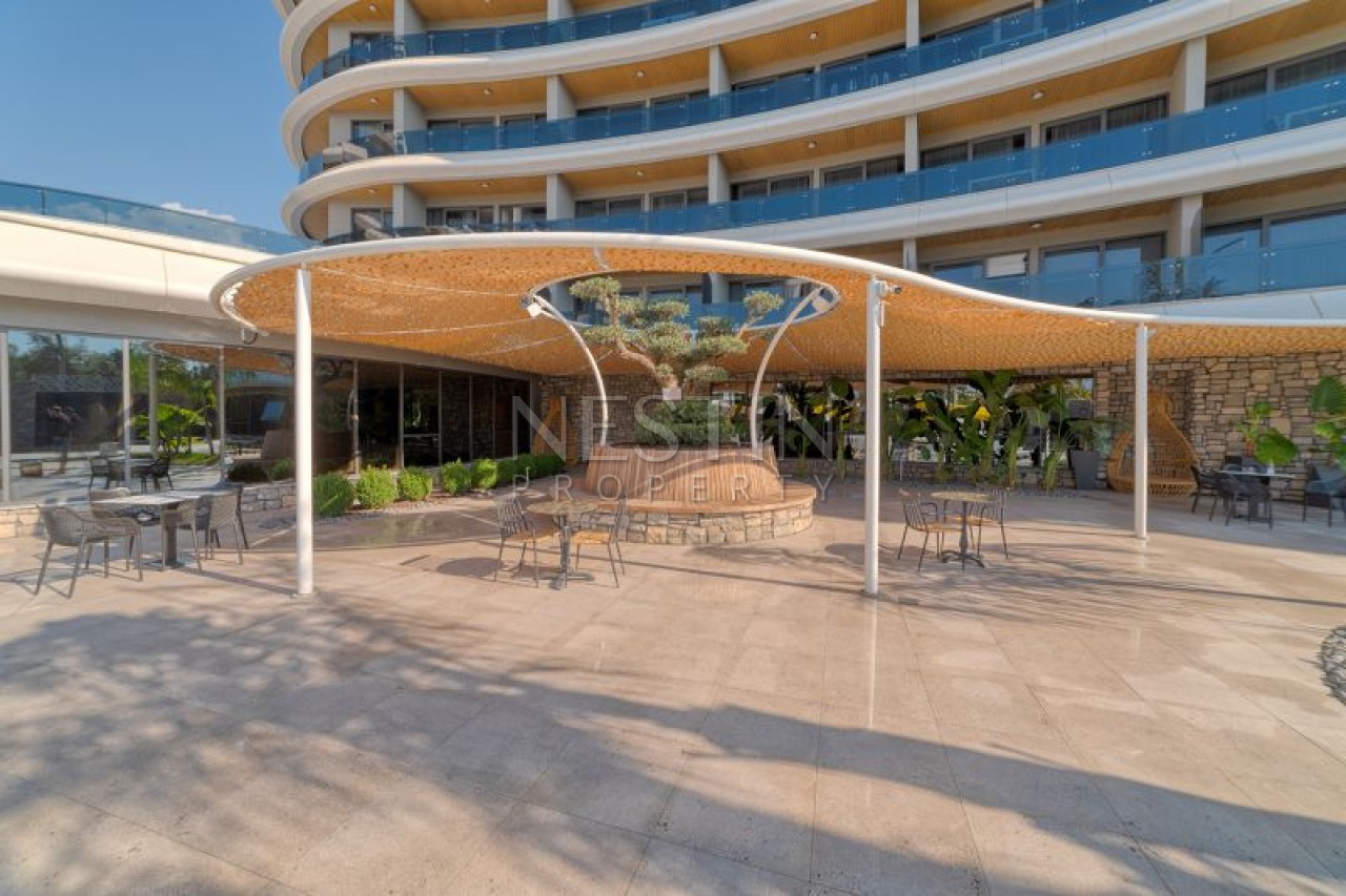 Kвартирa 1+1 с полной инфраструктурой в районе Каргыджак на первой береговой линии. фото 30