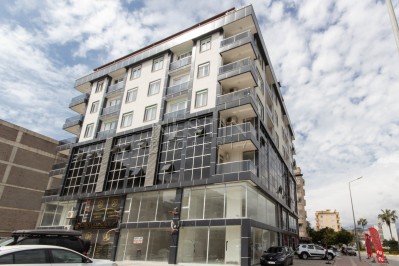 Новая меблированная квартира 1+1 в центре Махмутлара фото 1