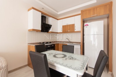 Новая меблированная квартира 1+1 в центре Махмутлара фото 8