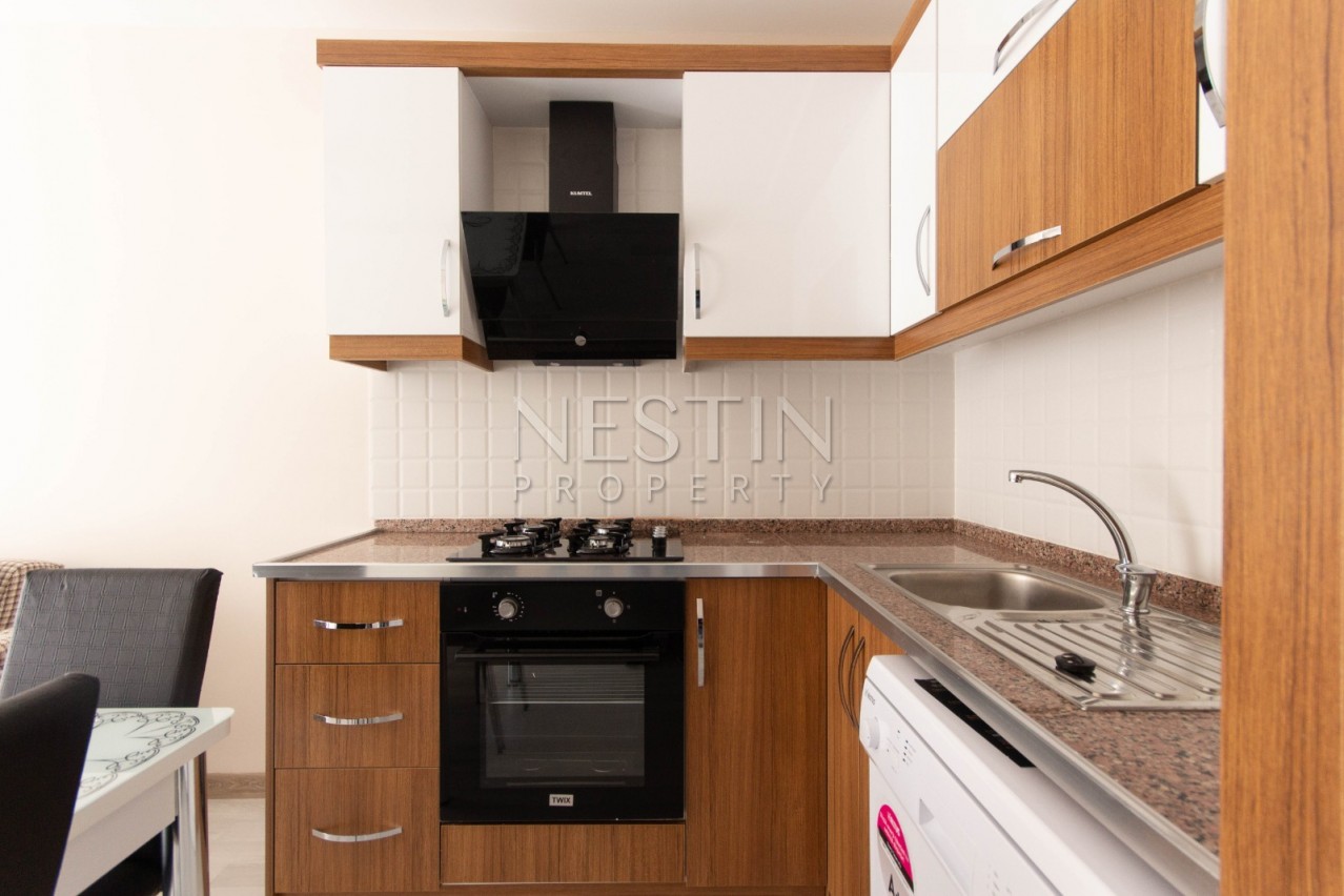 Новая меблированная квартира 1+1 в центре Махмутлара фото 15