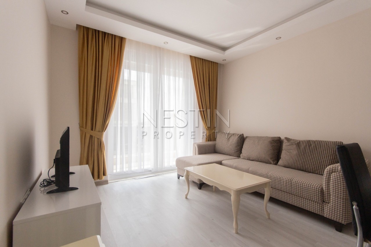 Новая меблированная квартира 1+1 в центре Махмутлара фото 19