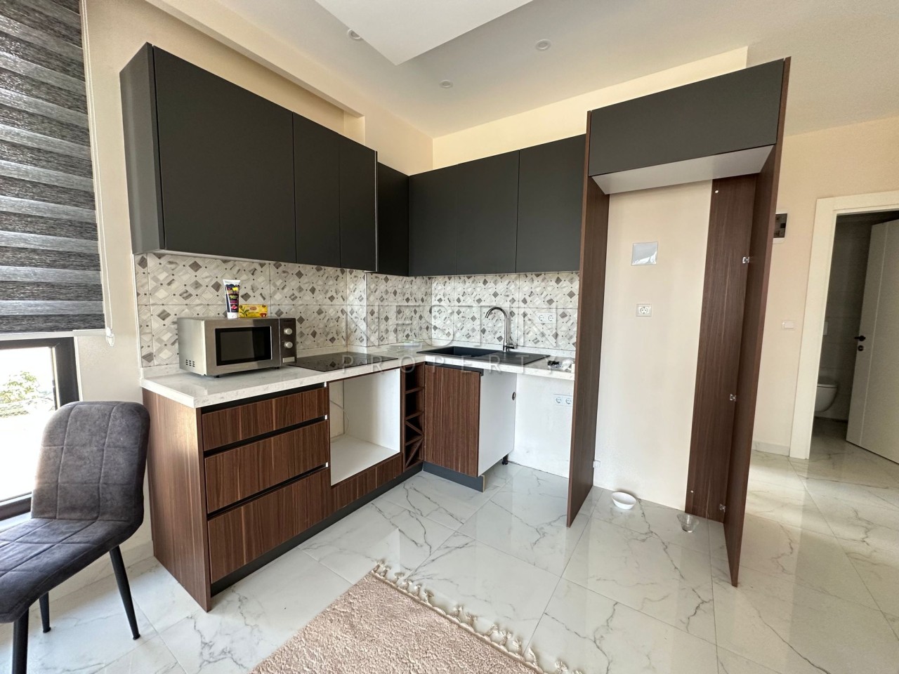 Квартира 1+1 в районе Махмутлар в новом жилом доме с видом на горы фото 4