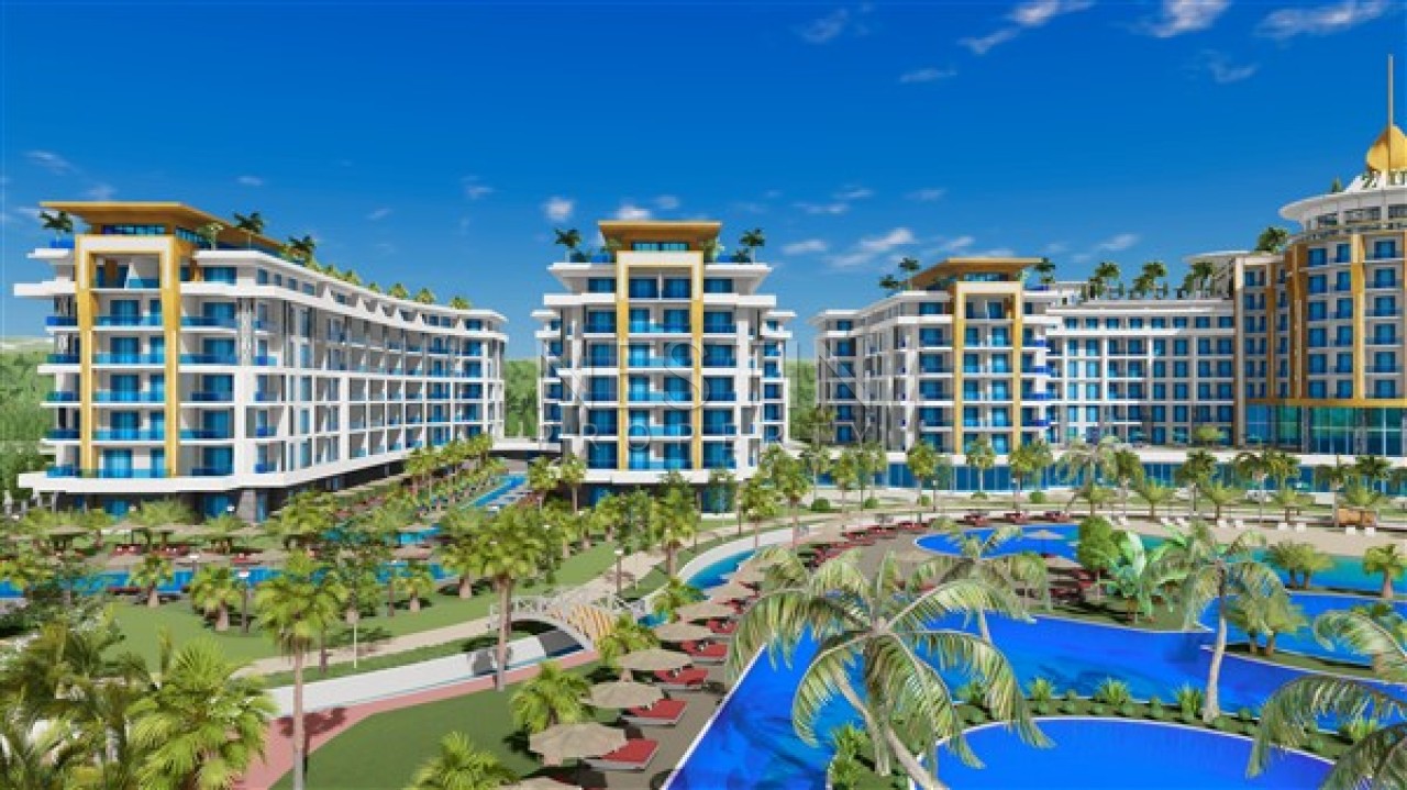 Квартира 1+1 в районе Тюрклер на стадии строительства в 300 м от Средиземного моря фото 4