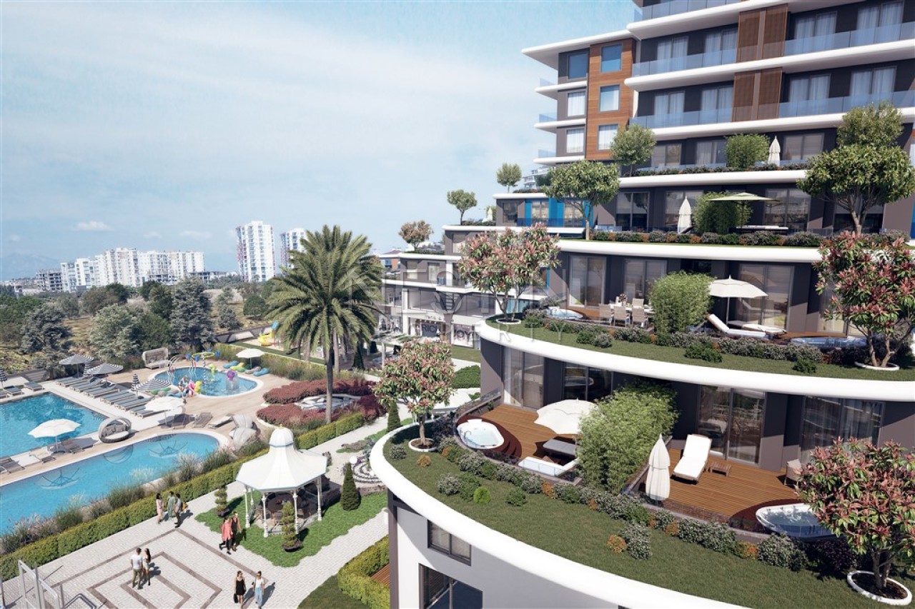 Новый жилой комплекс на стадии строительства в городе Анталья в районе Алтынташ фото 4