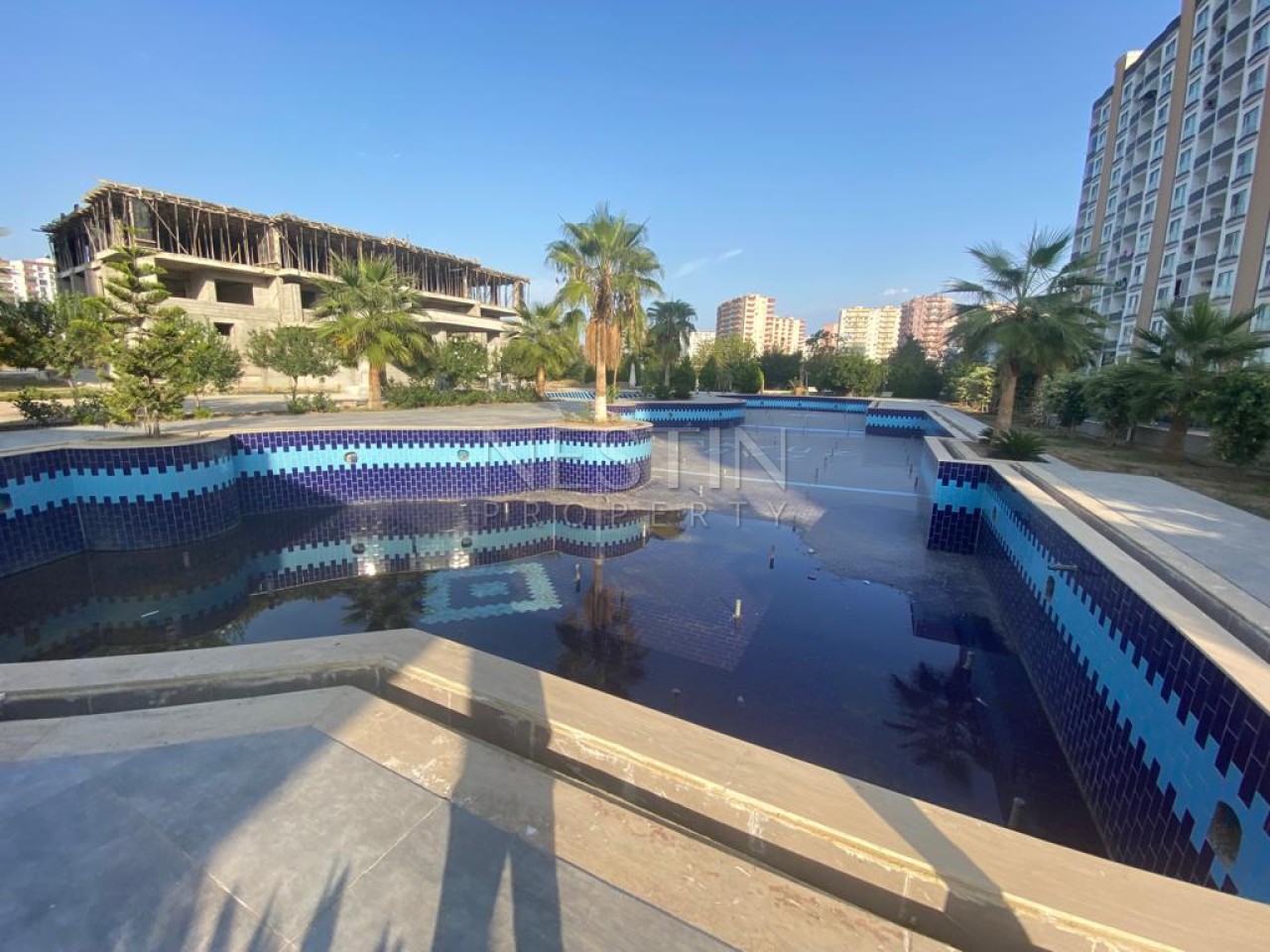 Квартиры 1+1 и 3+1 в городе Мерсин район Томюк в 300 м от Средиземного моря фото 10