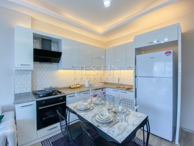 Квартира 1+1 в районе Демирташ в 800 м от Средиземного моря фото 1