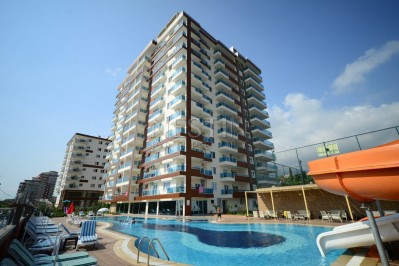 Квартира 2+1 с мебелью в новом комплексе в Махмутларе фото 1