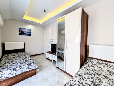 Просторная квартира 2+1 в новом доме в центре Махмутлара фото 19