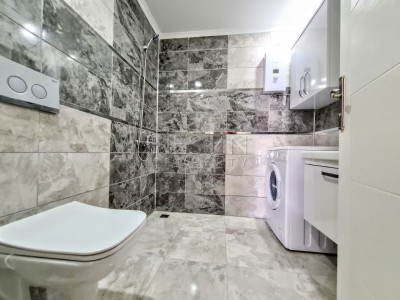 Просторная квартира 2+1 в новом доме в центре Махмутлара фото 28