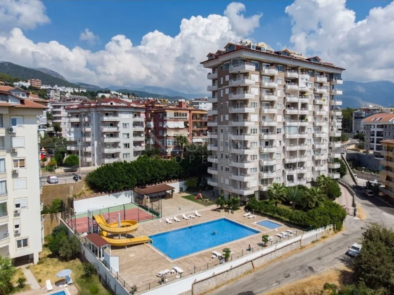 Квартира 1+1 в районе Джикджилли с видом на море и горы фото 1