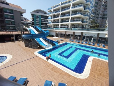 Квартира 1+1 в районе Джикджилли в 800 м от Средиземного моря фото 1