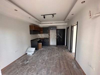 Квартира 1+1 в городе Мерсин район Томюк в 250 м от Средиземного моря фото 5